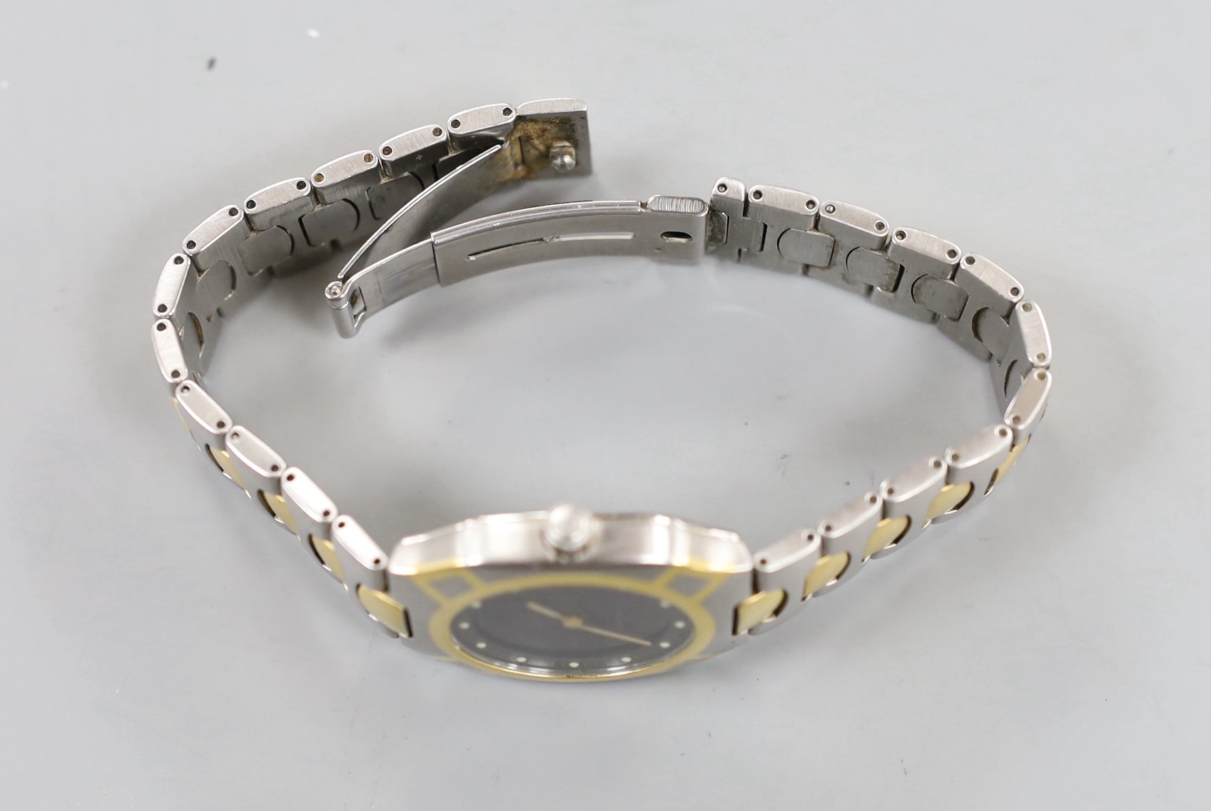 A gentleman's modern steel and gold plated Omega Seamaster quartz wrist watch, case diameter 32mm, with box, no papers.